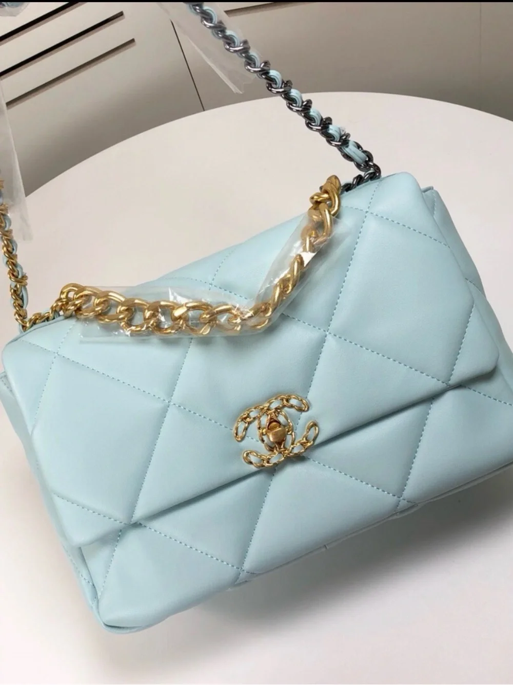 CC quilted leather flap shoulder bag